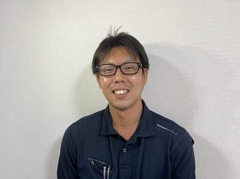 営業部長 飯岡 友貴